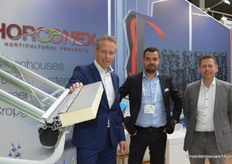 No, Vincent Kuijvenhoven is not handing over a book while posing for the picture together with Simon Le Coz and Nicolas Bernard (Horconex Horticultural Projects)